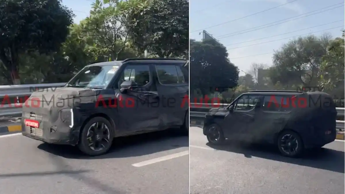 Kia Syros EV Spotted While Testing Wrapped in Black Cover